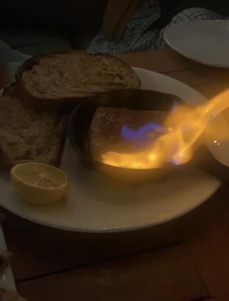 Astra cheese saganaki with bread. Set on fire at table side. #food $18
