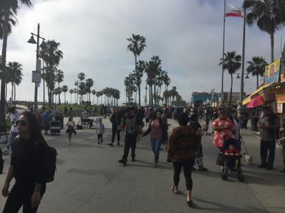 Venice Beach Boardwalk on a Sunday, crowded.