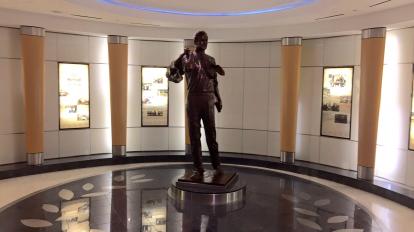A statue of George Bish at  the airport in Houston Terminal C