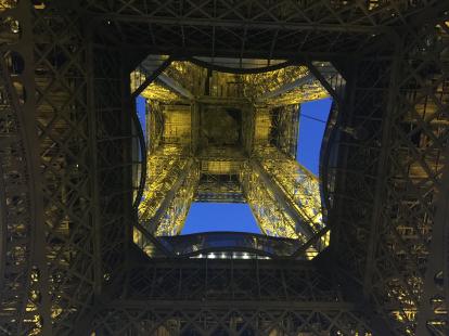 Looking up at the Eiffel Tower from the center