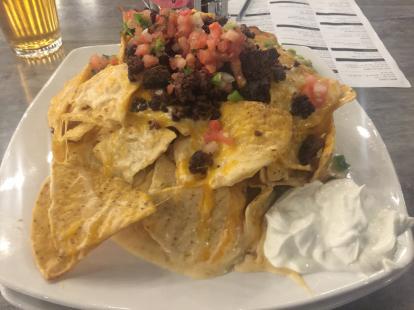 Mile high nachos with beef at Broken Spoke #food $10 2019 excellent 