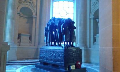 Napoleon's Tomb. A statue of 8 men carrying a casket. Each area of Napoleon's tomb