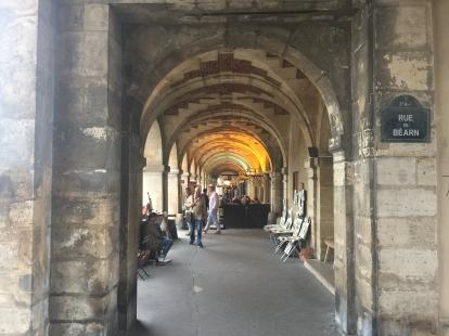 Rue de Bearn archway around the Place des Vosges
