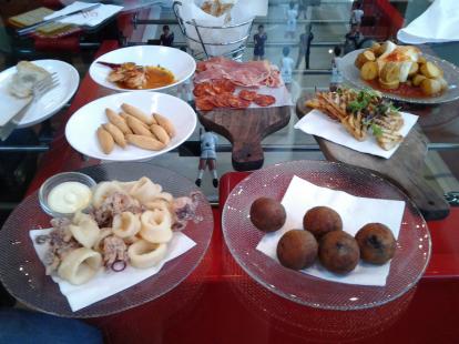 Happy hour at Jaleo #food served on a foosball table. Tapas. #food excellent fried cheese