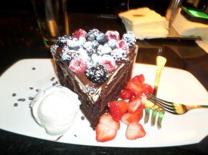 Nick and Sam's Steakhouse. The largest chocolate cake in Texas. This is the small slic