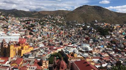 A broad view of Guanajuato City. In the bottom left is Parroquia de Basilica Colegiata de 